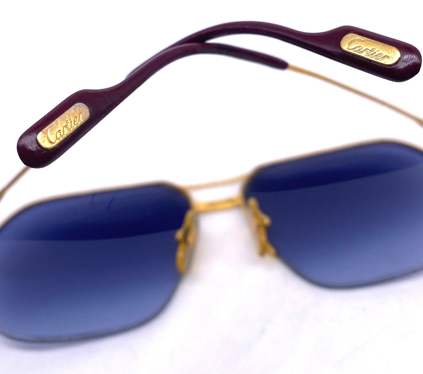 Cartier Orsay aviator sunglasses in golden metal w half rimmed structure, brand new lenses; made in France 1980s