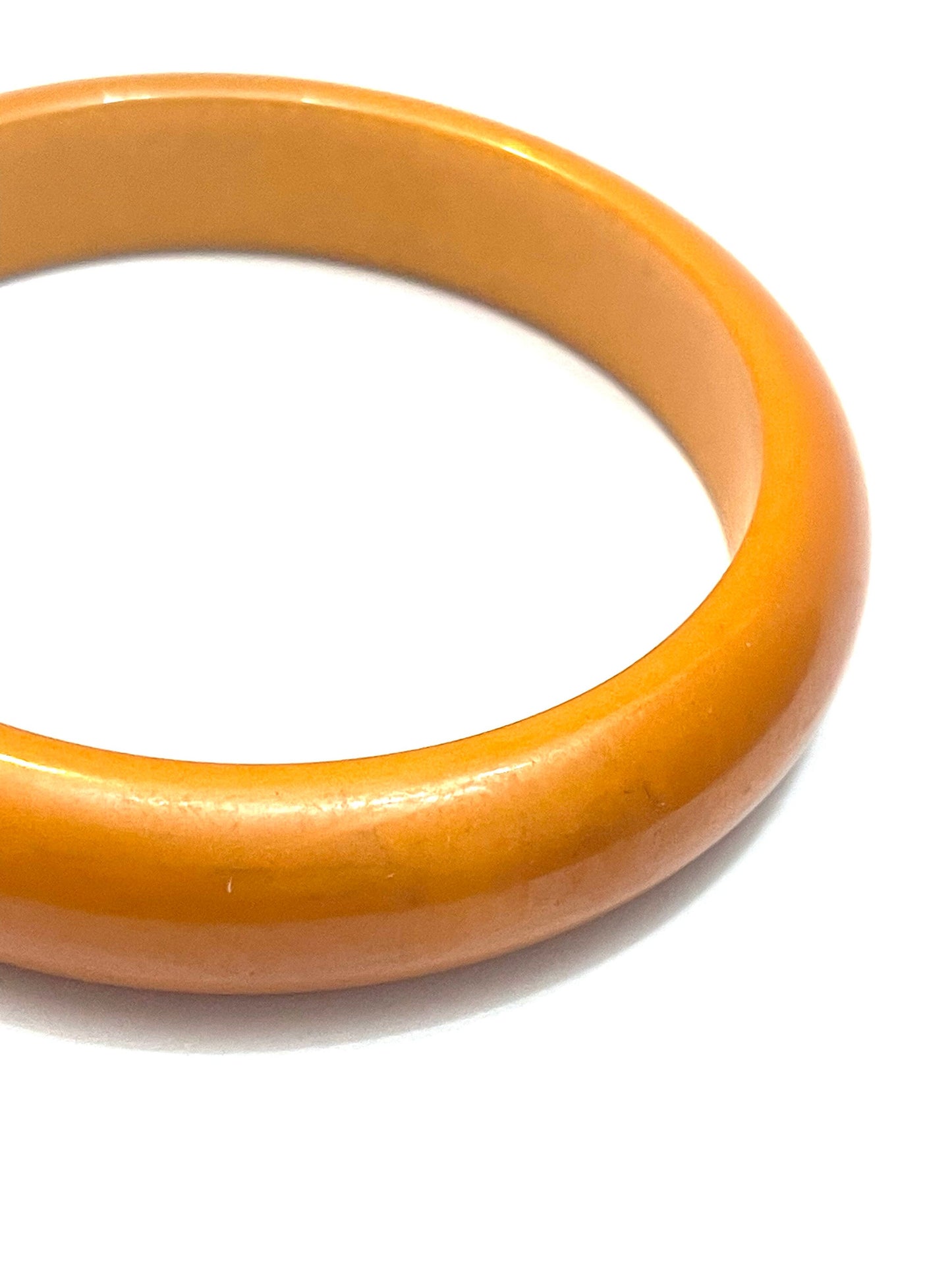 1950s ca plain Bakelite bangle bracelets, coming in a variety of colors in mint condition.