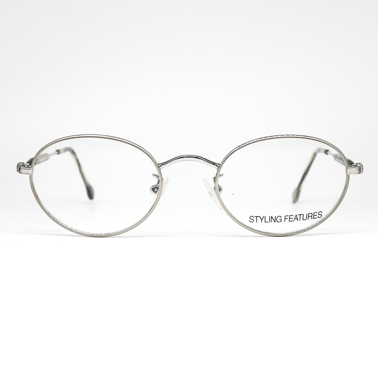 Dollond & Aitchison montature per occhiali da vista in metallo argento opaco di forma ovale minimale, NOS anni '80