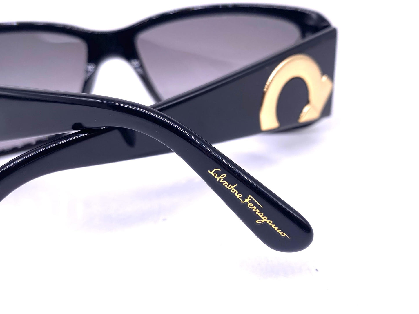 S Ferragamo black rectangular acetate sunglasses w golden metal details / logo inlays, NOS
