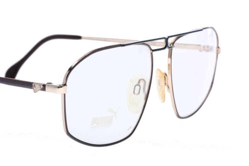 Puma avant garde pilot eyeglasses w grey/navy enameled details, NoS 80s Germany