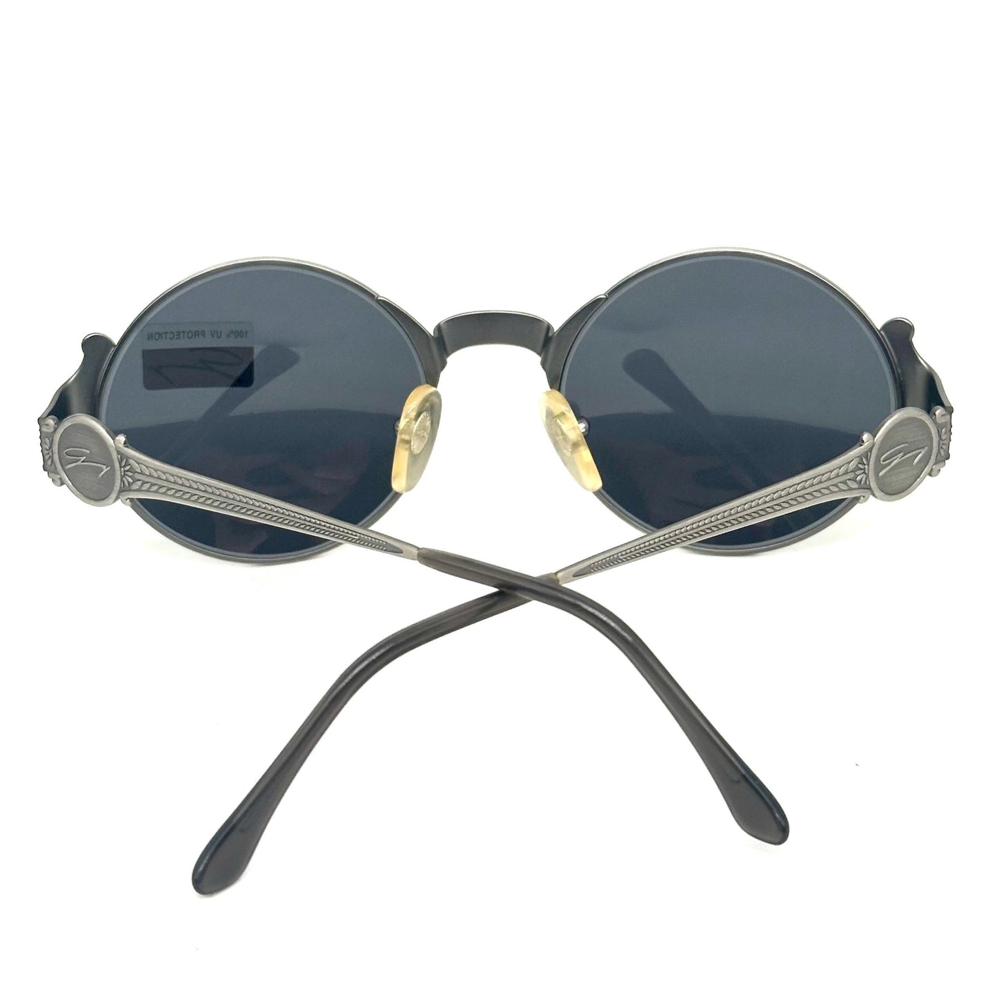 Genny 581-S warm metallic grey oval sunglasses with carved floral temples detail made in Italy 90s NOS