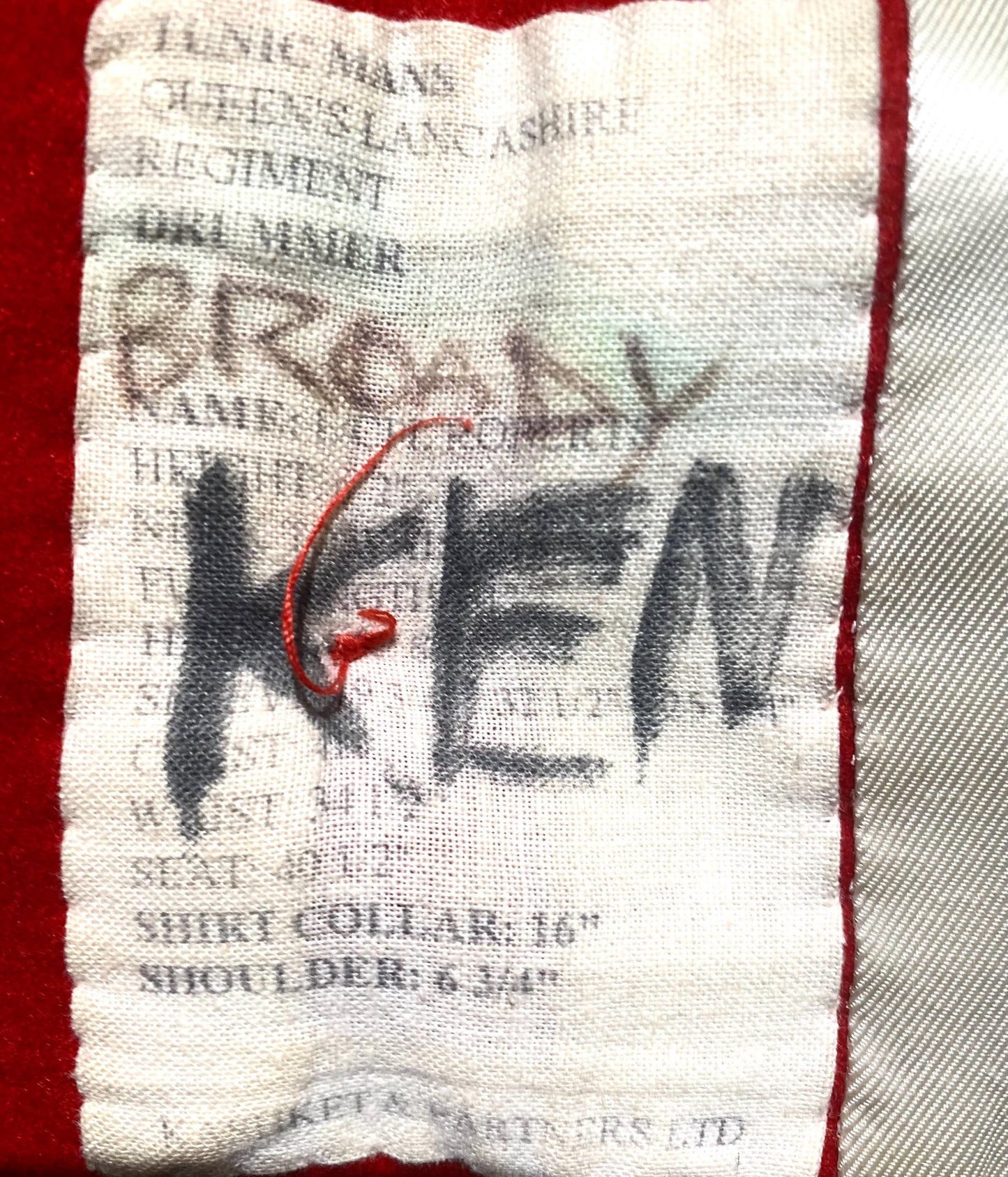 Royal Guards red parade drummers tunic in great condition, w division patch & shoulder adornements, sz L man