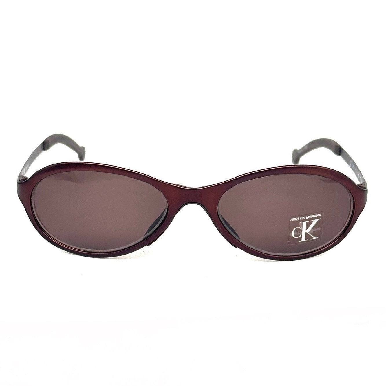 Calvin Klein 2012 modernist burgundy oval metal sunglasses made in Italy in the 90s, NOS