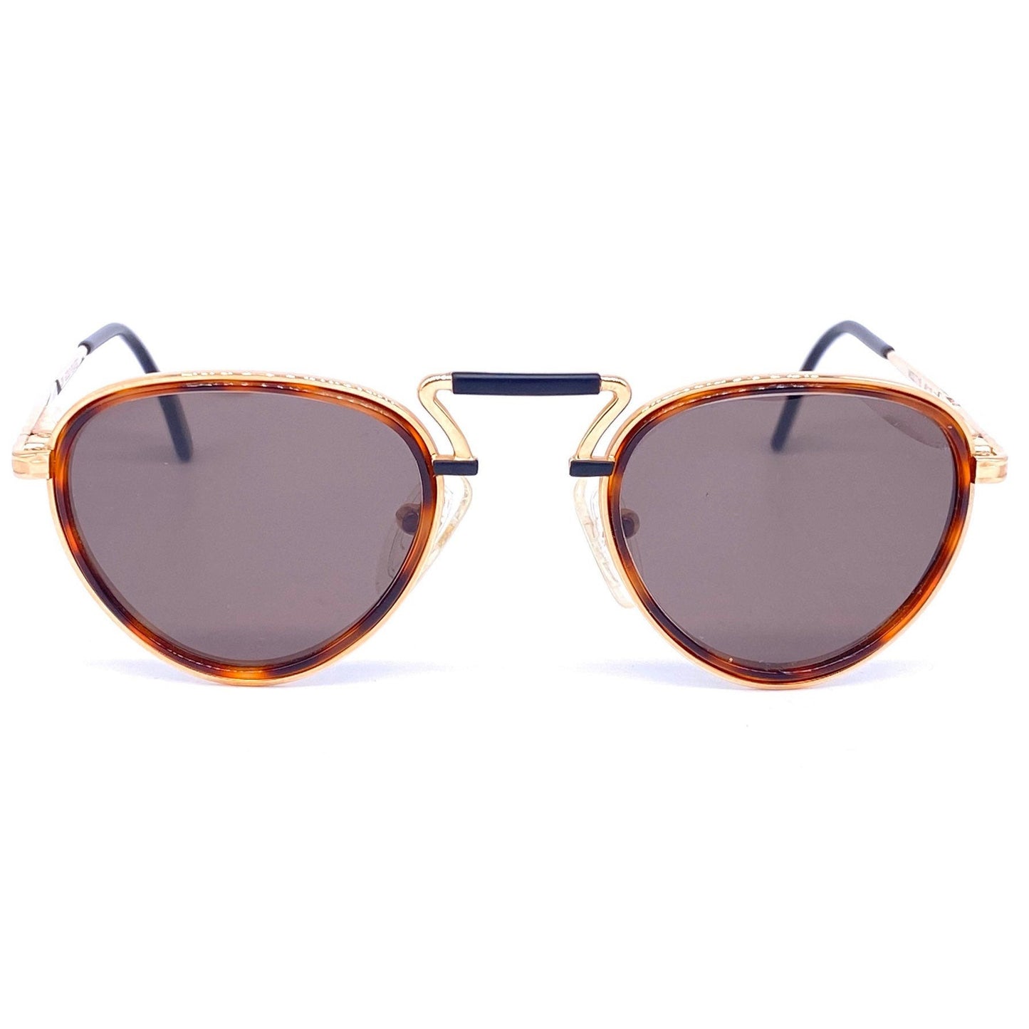 Tiffanys 23K gold plated round sunglasses with a superb design, rare and collectible piece in NOS condition.