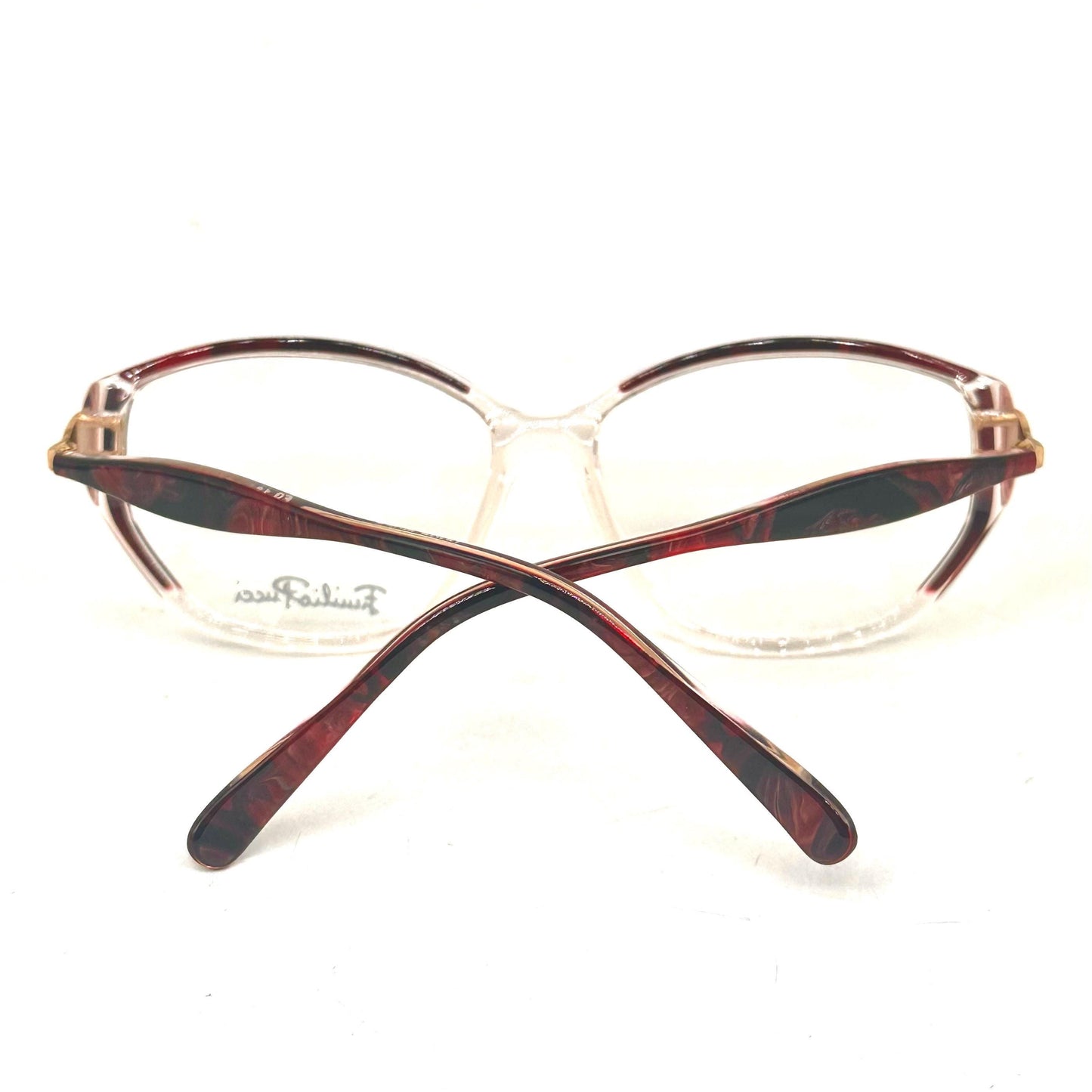 Emilio Pucci 493 clear eyewear detailed with red and black fluid marble parts and gold temples 80s NoS Made in Florence