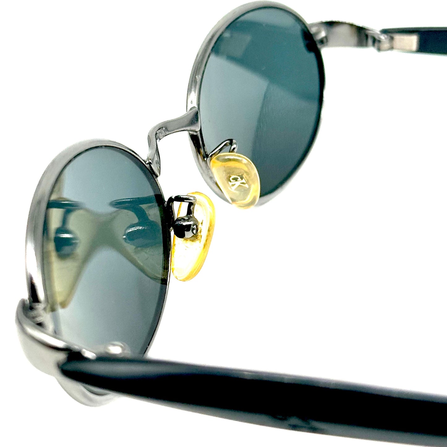 Calvin Klein 1010 oval silver metal sunglasses w black cello temples, NoS 90s Italy