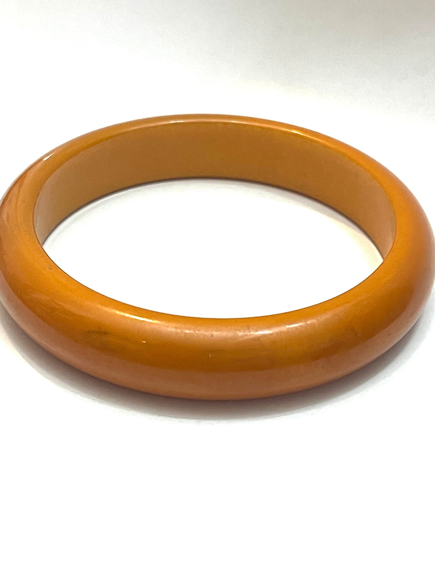 1950s ca plain Bakelite bangle bracelets, coming in a variety of colors in mint condition.