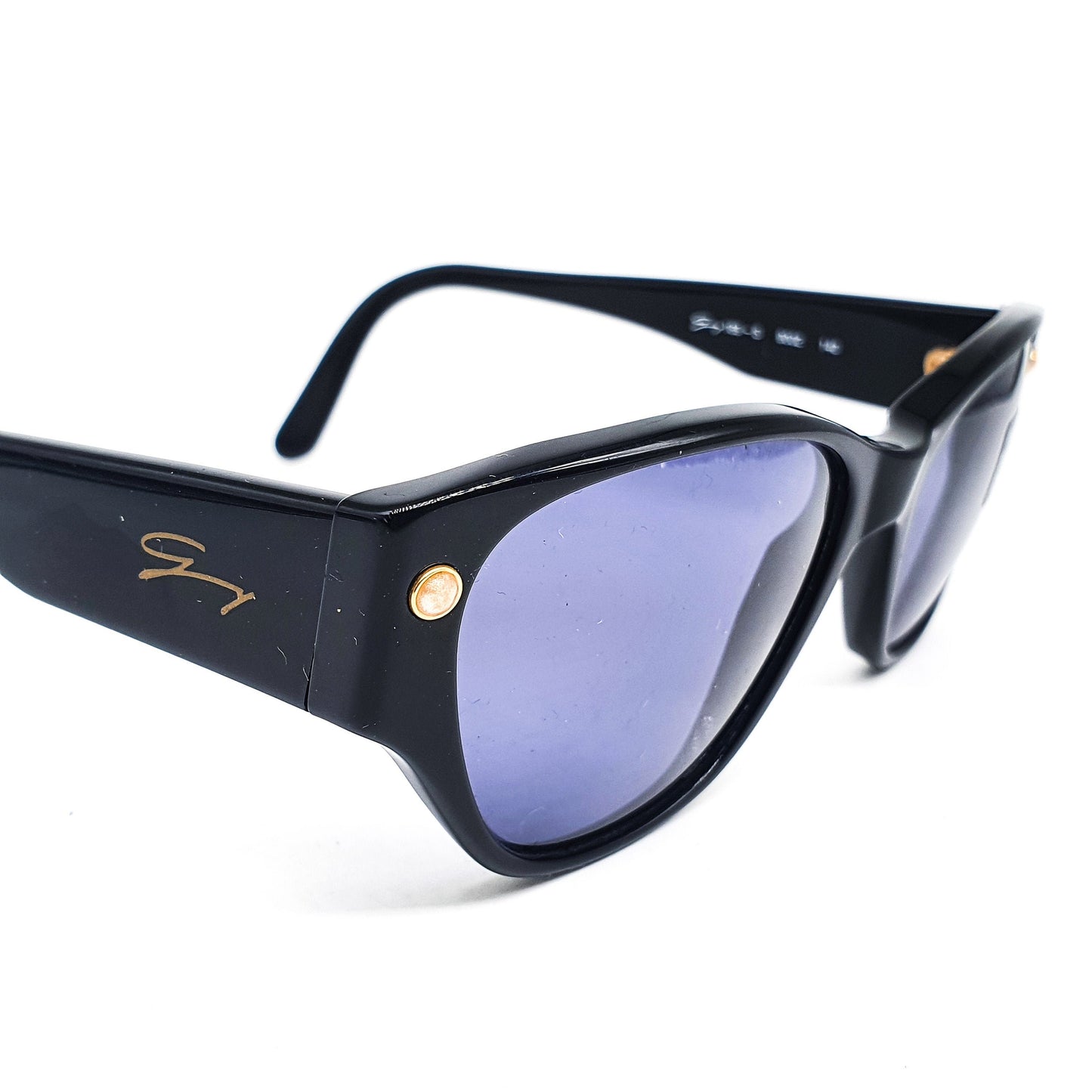Genny 169s black cellulose acetate cat eye sunglasses With dark blue lenses and shinny golden pins, Italy 70s NOS