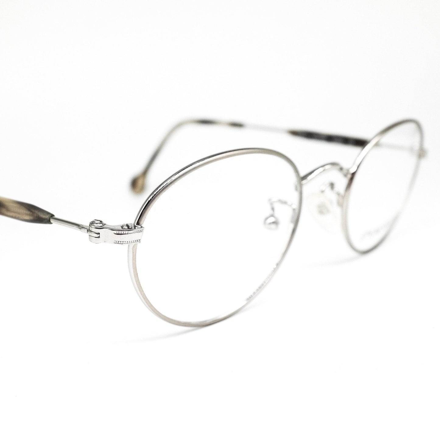 Dollond & Aitchison montature per occhiali da vista in metallo argento opaco di forma ovale minimale, NOS anni '80