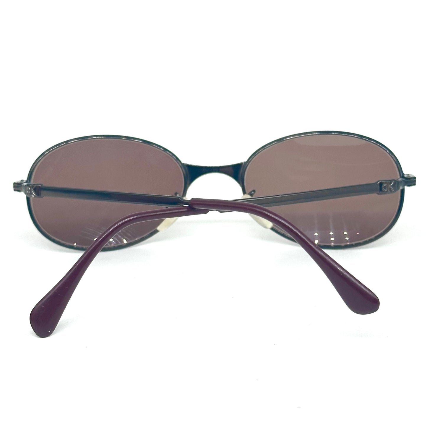 Calvin Klein 2004 gunmetal oval shaped sunglasses made in Italy, 90s NoS