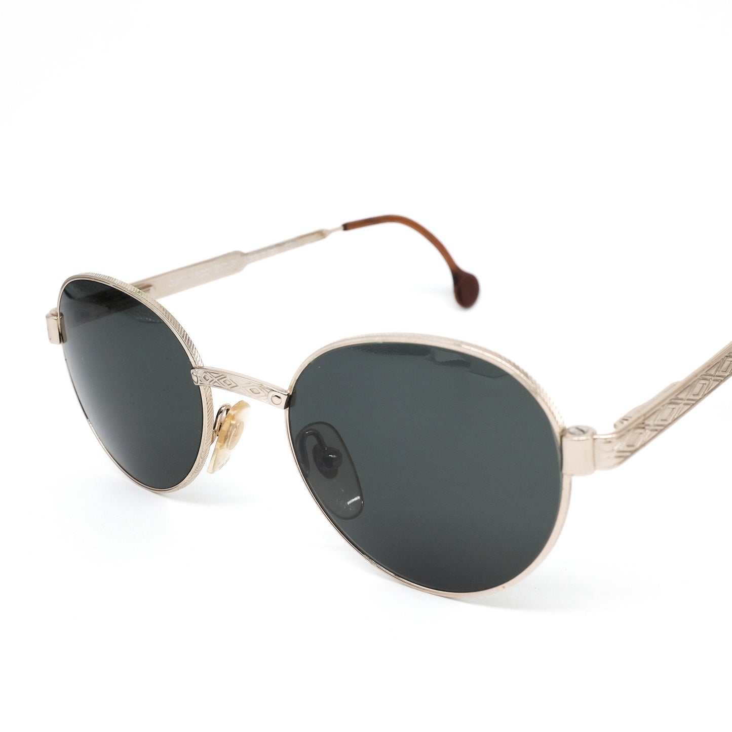 Gian Marco Venturi V932 classic oval minimal silver metallic sunglasses w/ black lenses in finely carved body 80s NOS Italy