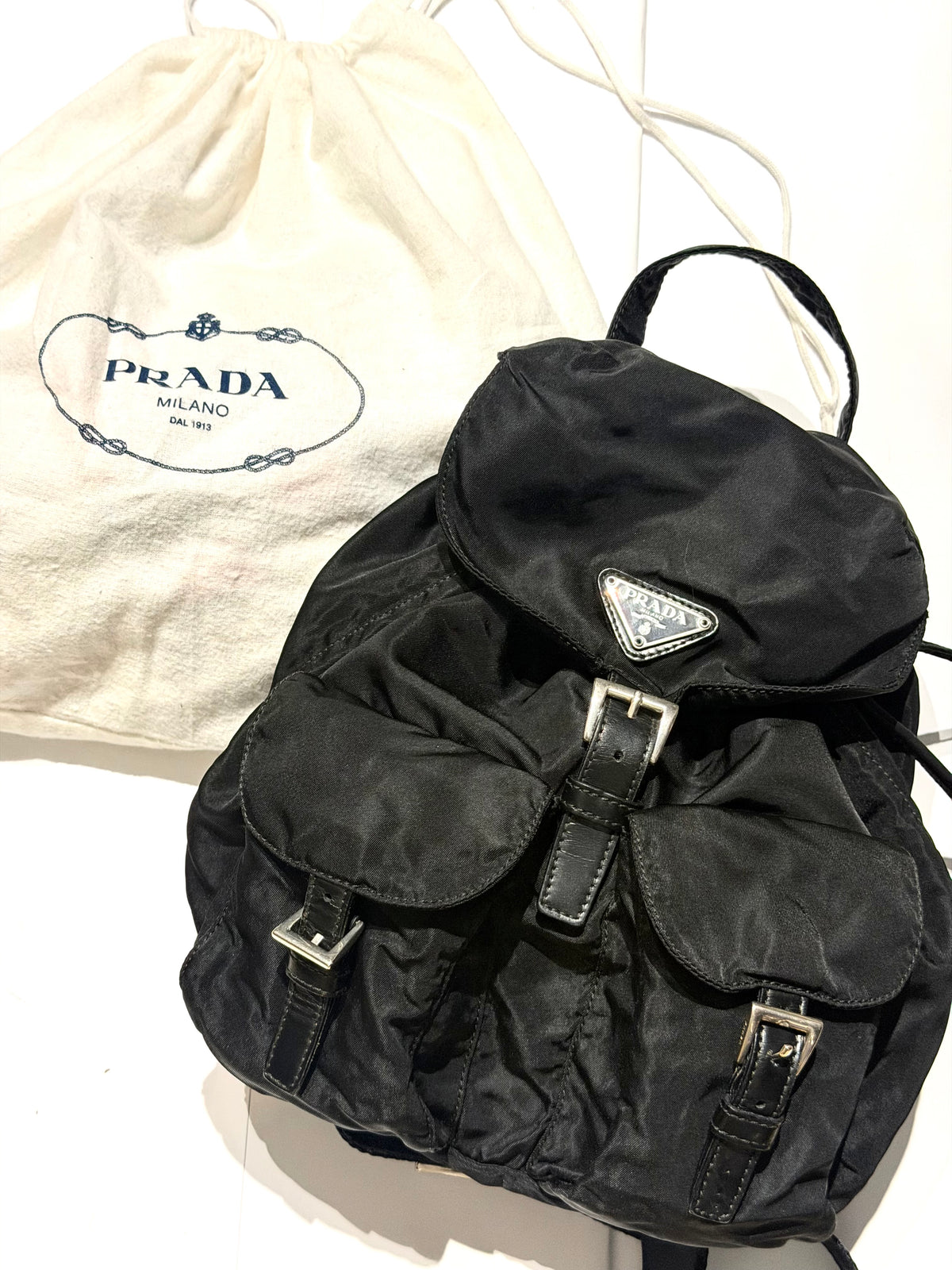 Prada 1978 small black nylon-leather backpack, iconic and perfect