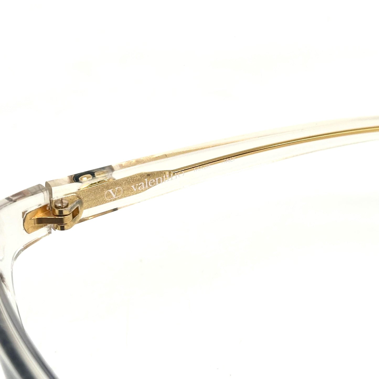 Valentino V606 modern cateye sunglasses in clear cello Golden V logo detail, NOS 90s.