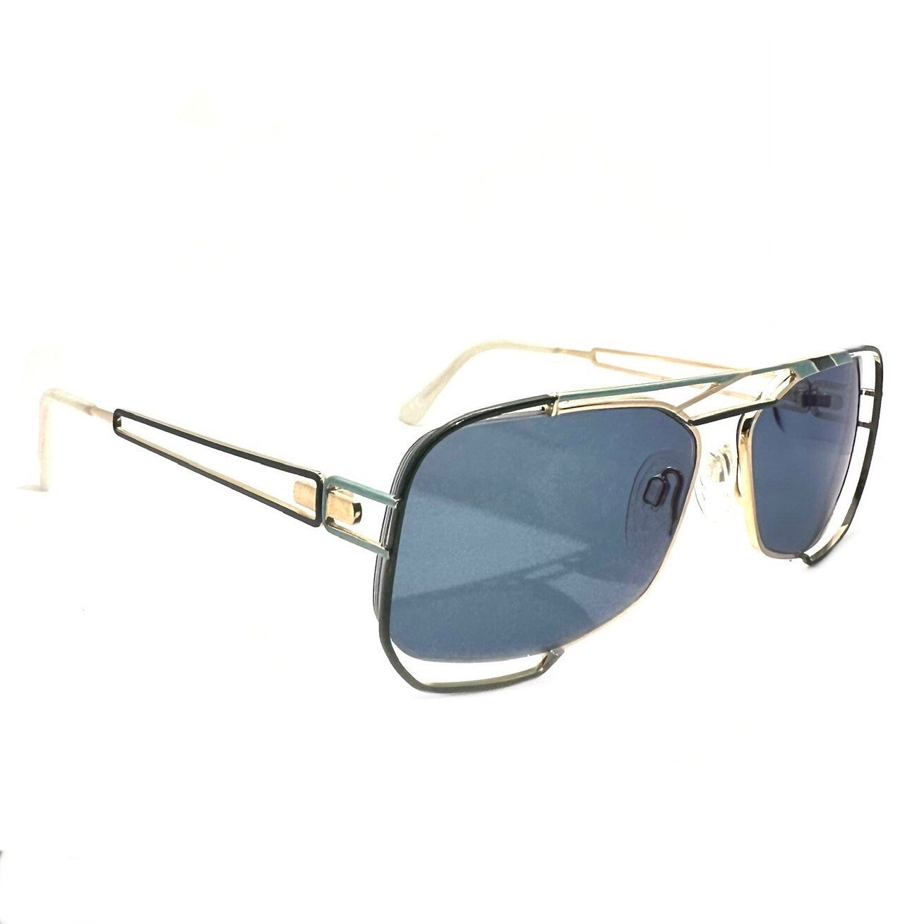 Neostyle jet 222 902 avant Garde sunglasses; gold w green and cyan enamel details & white cream ends, NOS 90s Germany