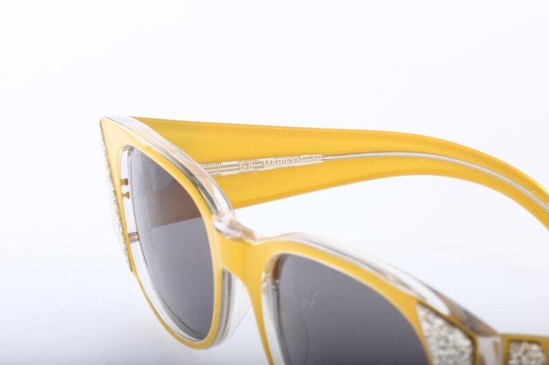 NV Marylin one of a kind rocker sunglasses, yellow / silver glitter asymmetrical pattern , NOS 80s mint