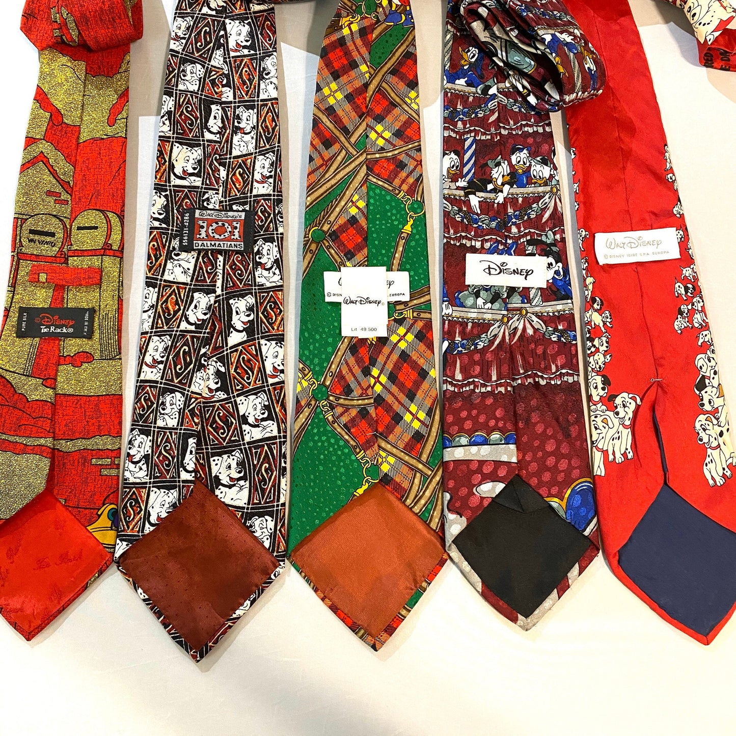 Disney official silk ties made in Italy, Goofy, Donald, Mickey, 101 Dalmatians, Minnie, mint condition.