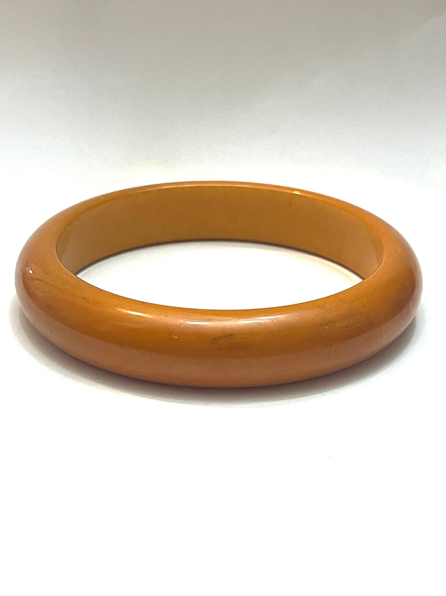 1950s ca plain Bakelite bangle bracelets, coming in a variety of colors in mint condition.