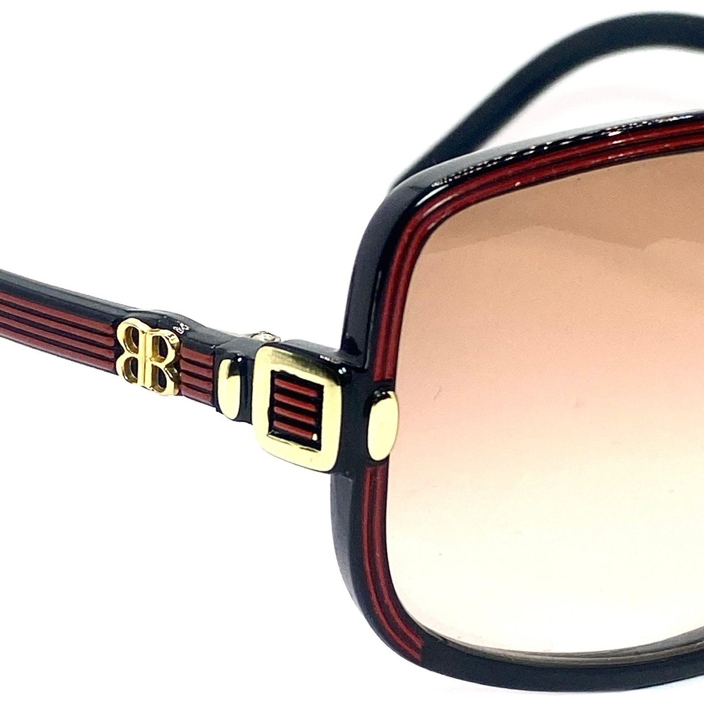 Balenciaga 2026 NR oversized black sunglasses with red carved stripes and golden logo, 80s Made in France