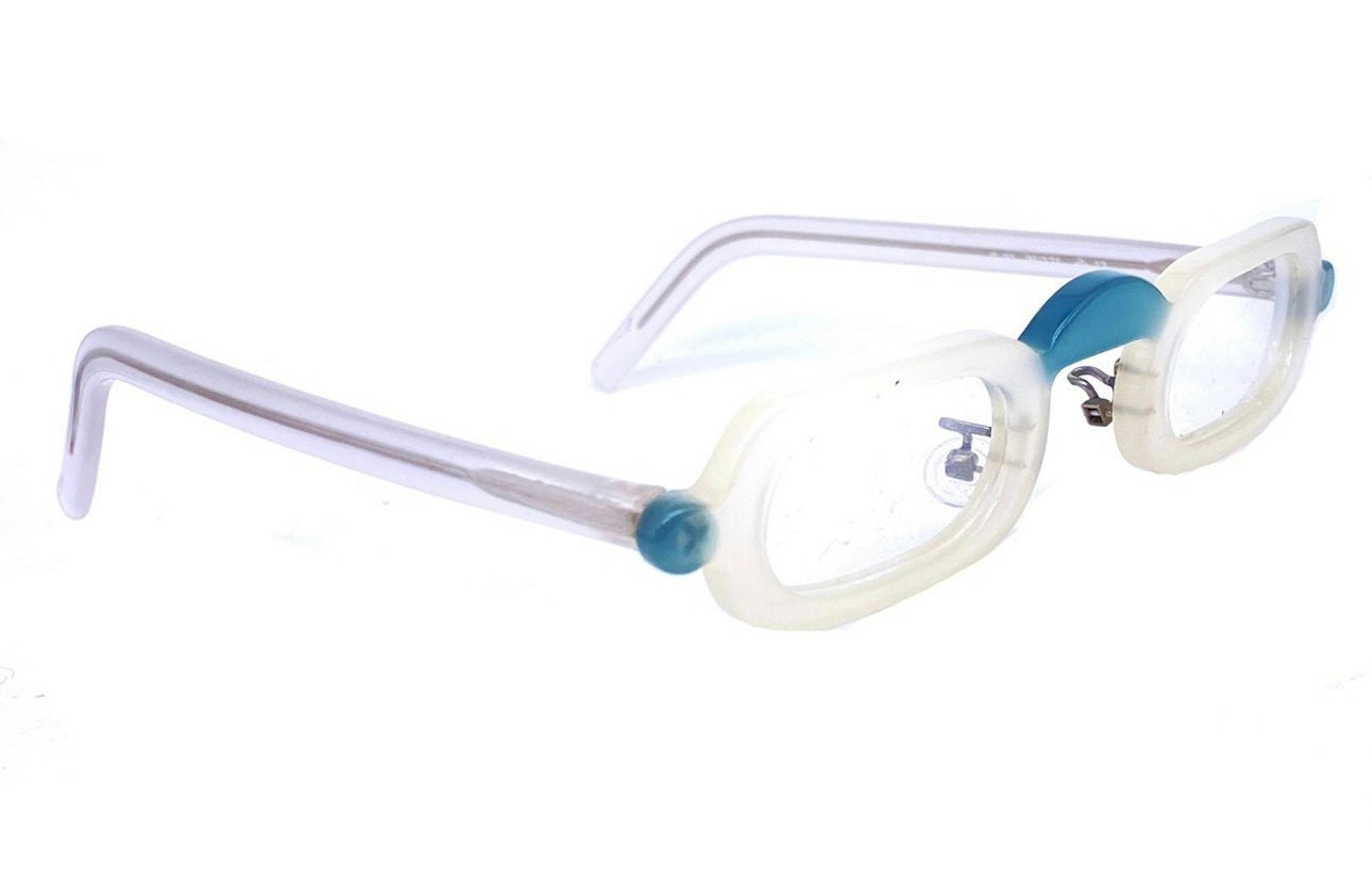 Tilt modernist celluloid reading eyeglasses hand made in Italy, coming in Green or clear color, 80s NOS