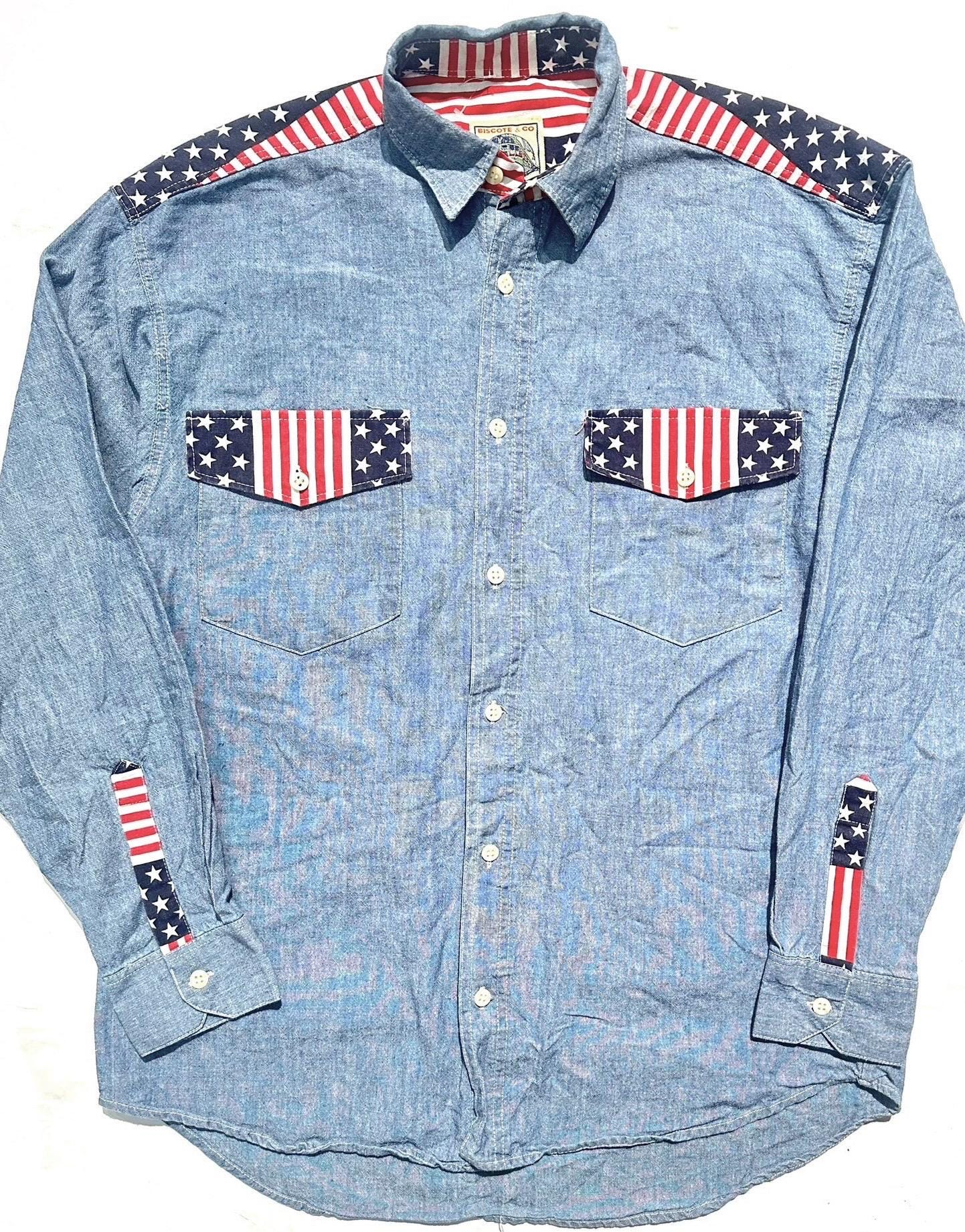 Biscote & Co denim shirt w US flag inserts at the collar, shoulders and cuffs, NoS 80s 2 pcs available.