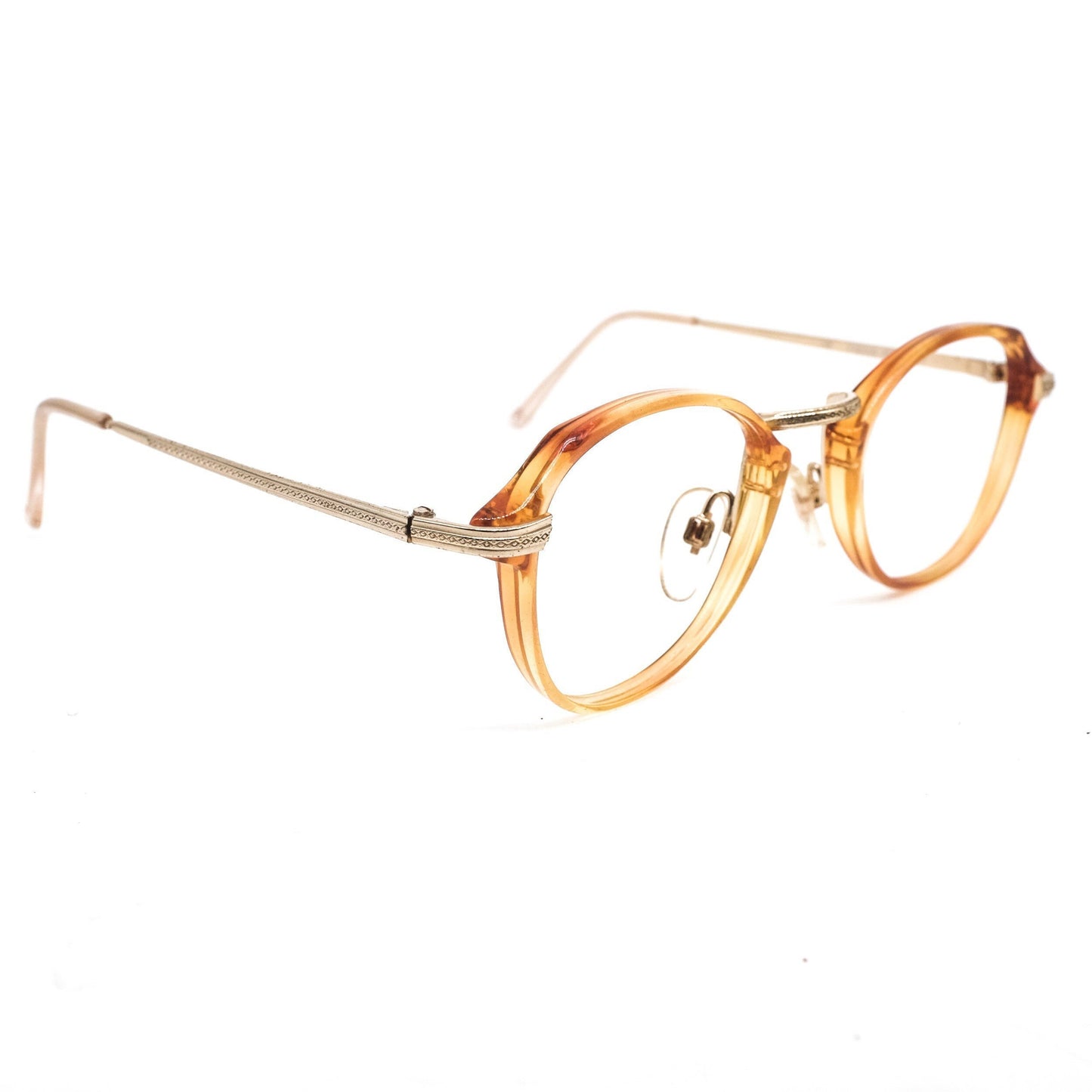 Safilo 1950s oval round cello semi amber eyeglasses frames with carved golden temples and nose bridge. Mint condition Made in Italy