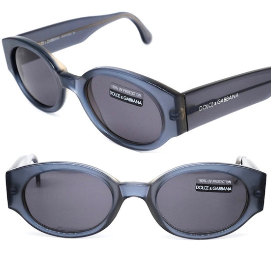 Dolce & Gabbana 700s oval translucent black acetate sunglasses made in Italy, 90s NOS