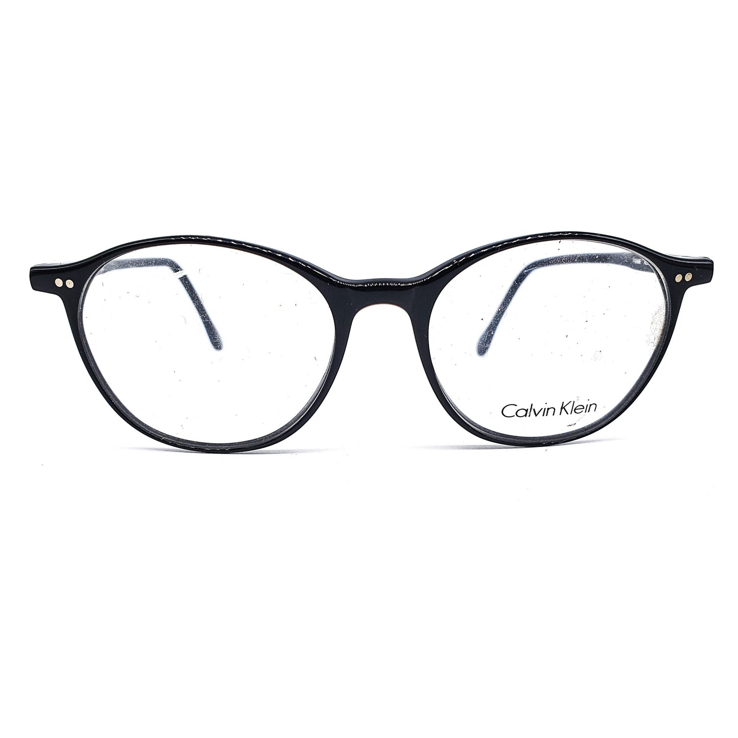 Calvin Klein CK620 round black glossy cellulose acetate eyeglasses frames with classic rivets details NOS 90s Italy