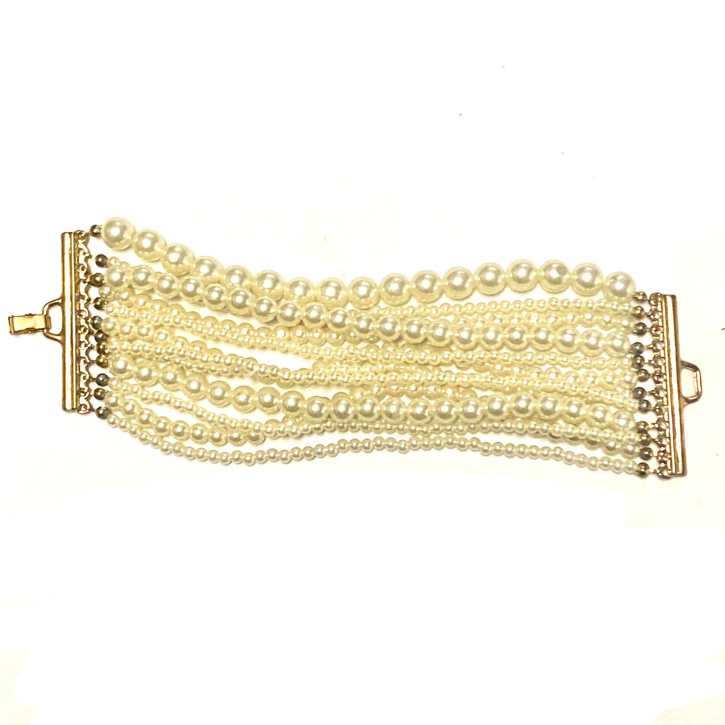 Bracelet w Faux Pearls, multiple lines of different sizes  with brass mount, NOS 80s
