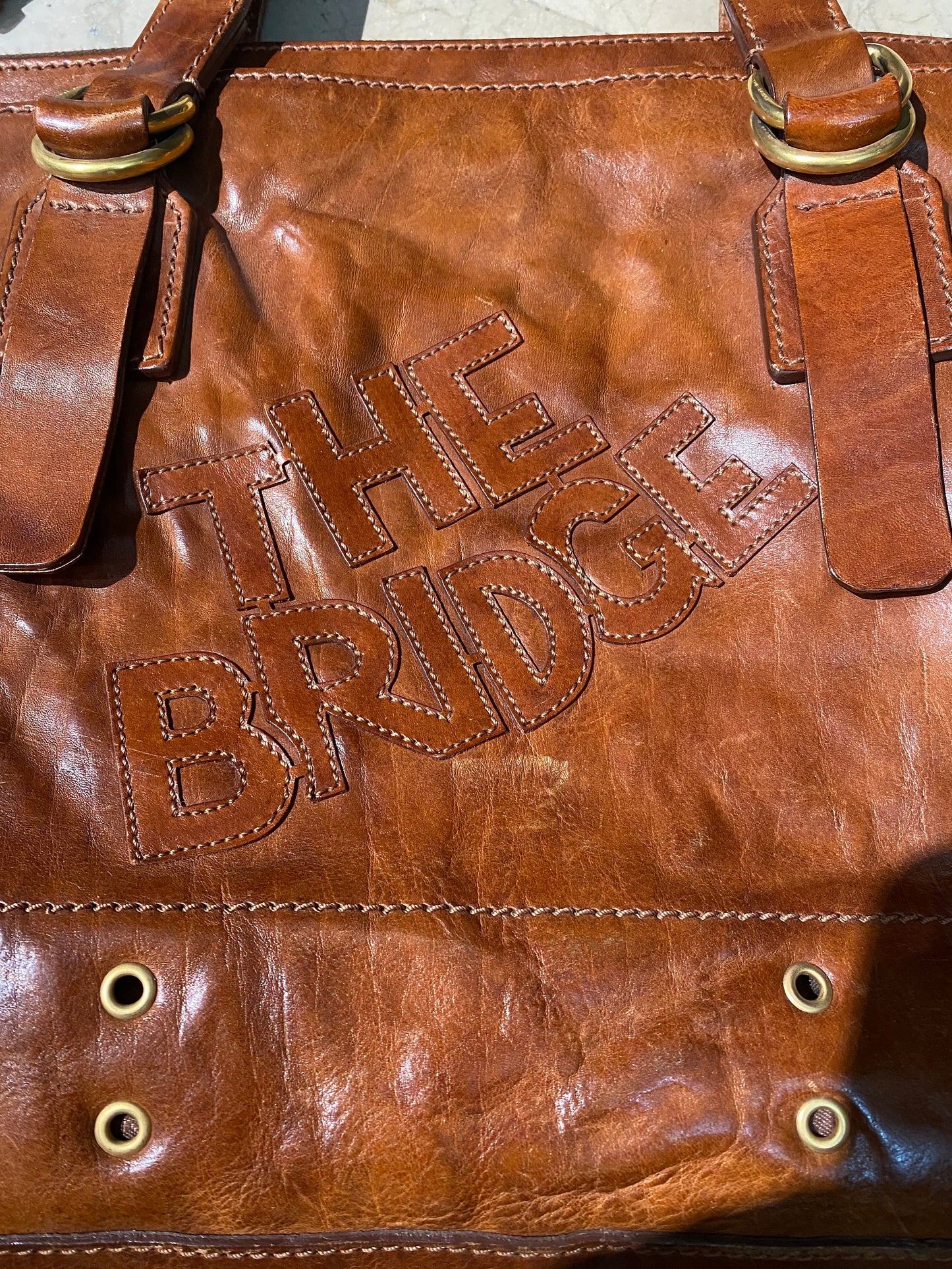 The Bridge tan leather shoulder bag with golden eyelets/studs,  1980s Italy Mint