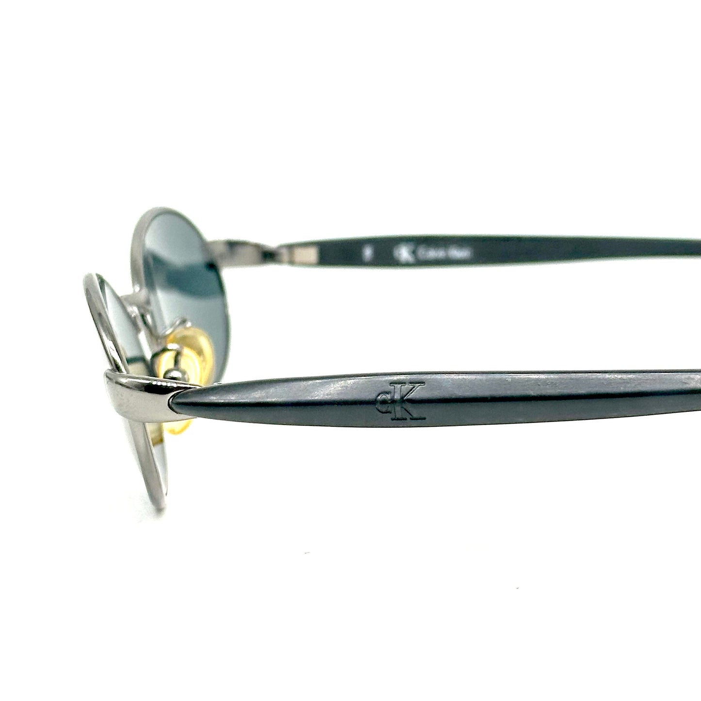 Calvin Klein 1010 oval silver metal sunglasses w black cello temples, NoS 90s Italy