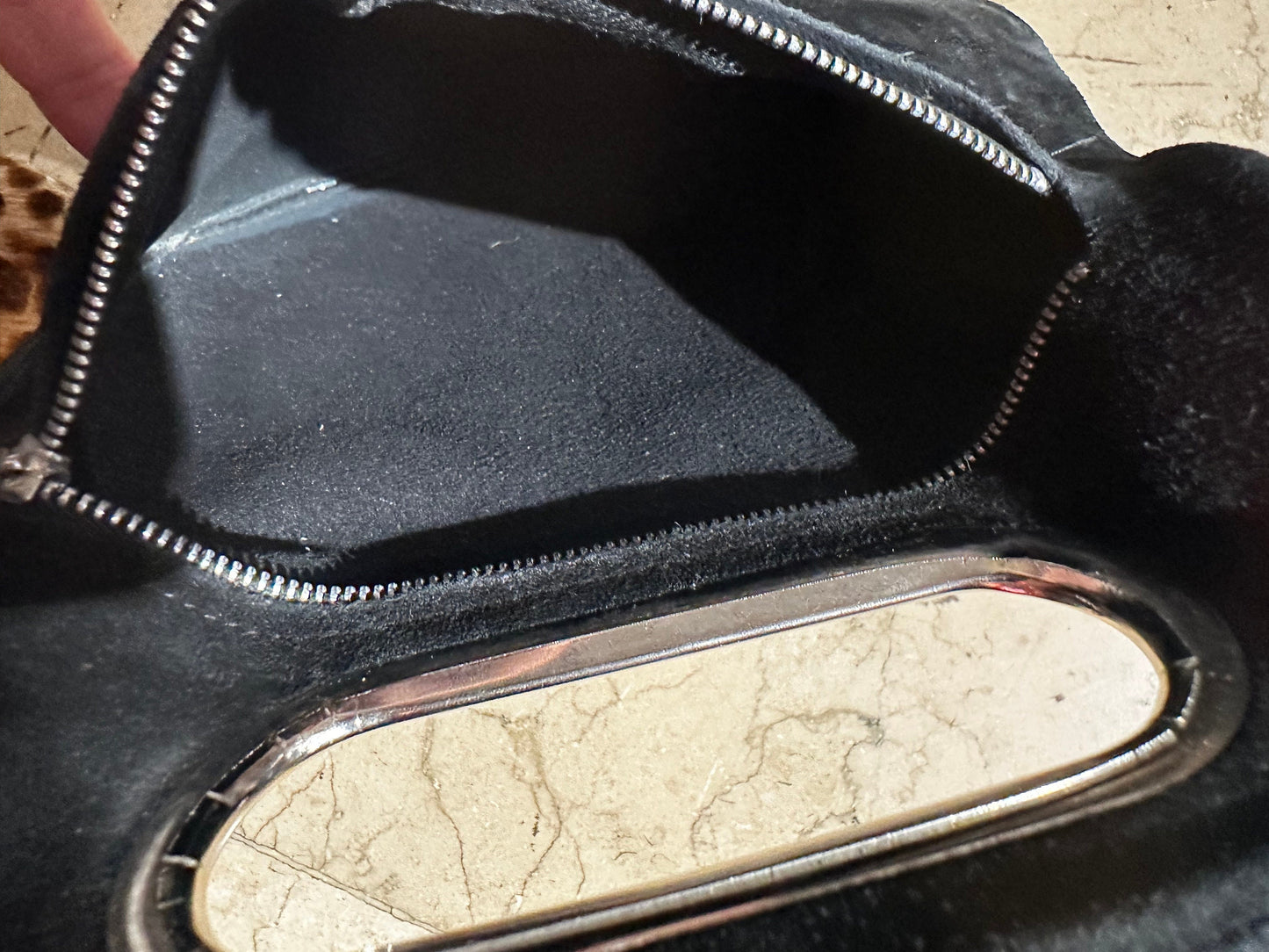 Minimal 60s mod suede pouch with cutoff silver handle and zipper closure, mint