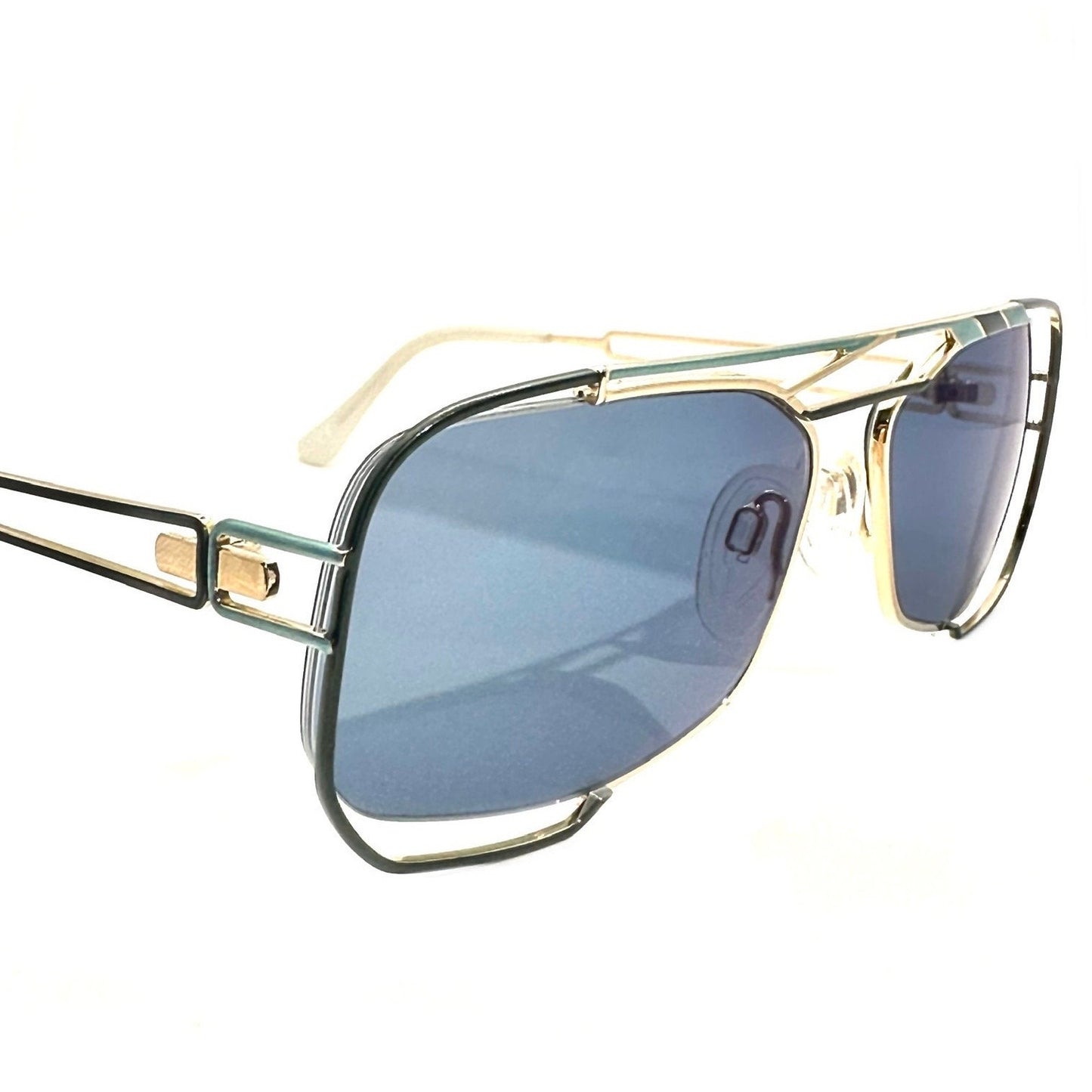 Neostyle jet 222 902 avant Garde sunglasses; gold w green and cyan enamel details & white cream ends, NOS 90s Germany