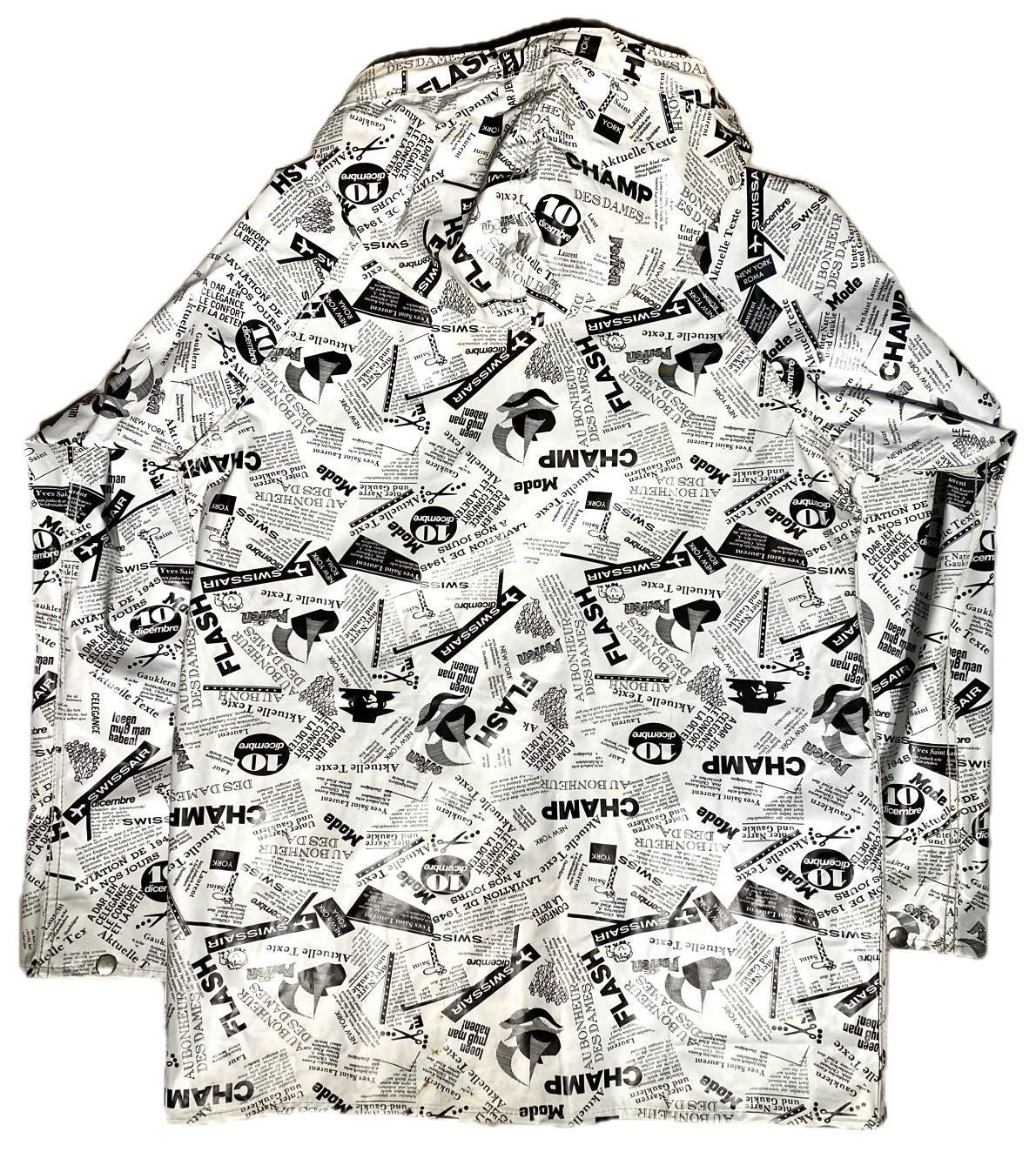 Renco Marwell hooded reversible rain jacket, black nylon & b/w fashion news print PVC jacket, sz S, XL