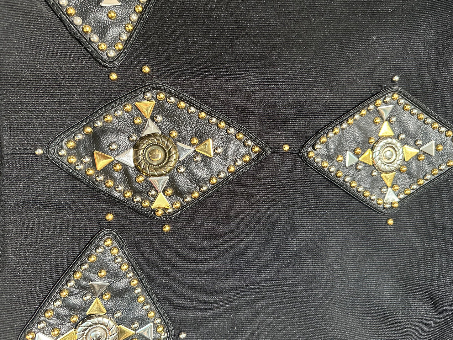 80s Paris couture set bolero and trousers in cotton/elast fully adorned w leather patches, studs & conchos, sz S/ 1
