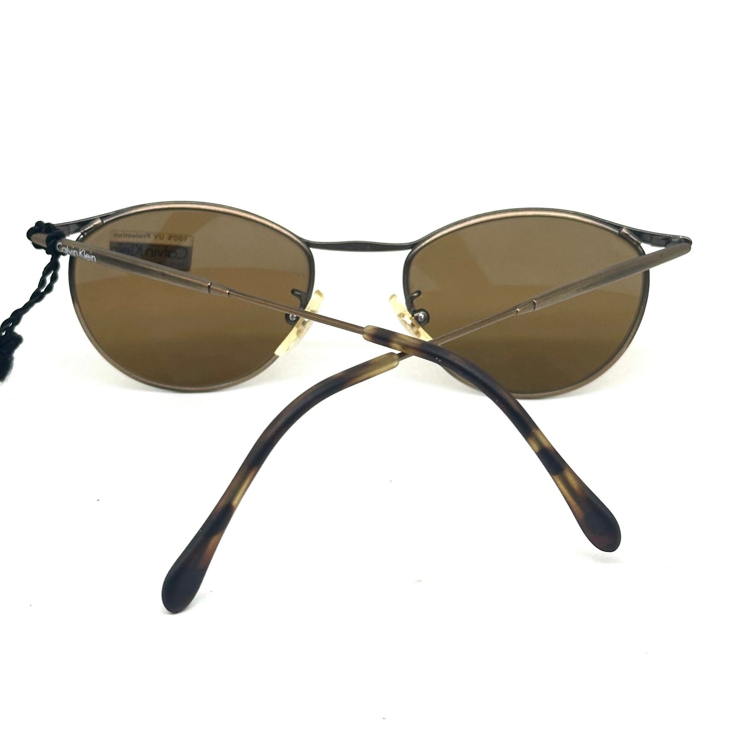 Calvin Klein 222S retro metal cateye sunglasses w crystal tempered lenses, NoS 90s