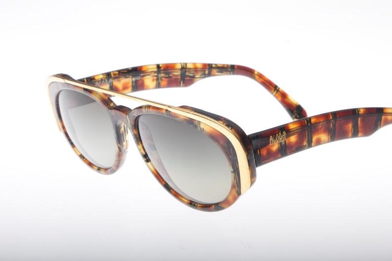 Polaroid coolest oval tortoise sunglasses w unique golden arch browline, NoS 80s Italy