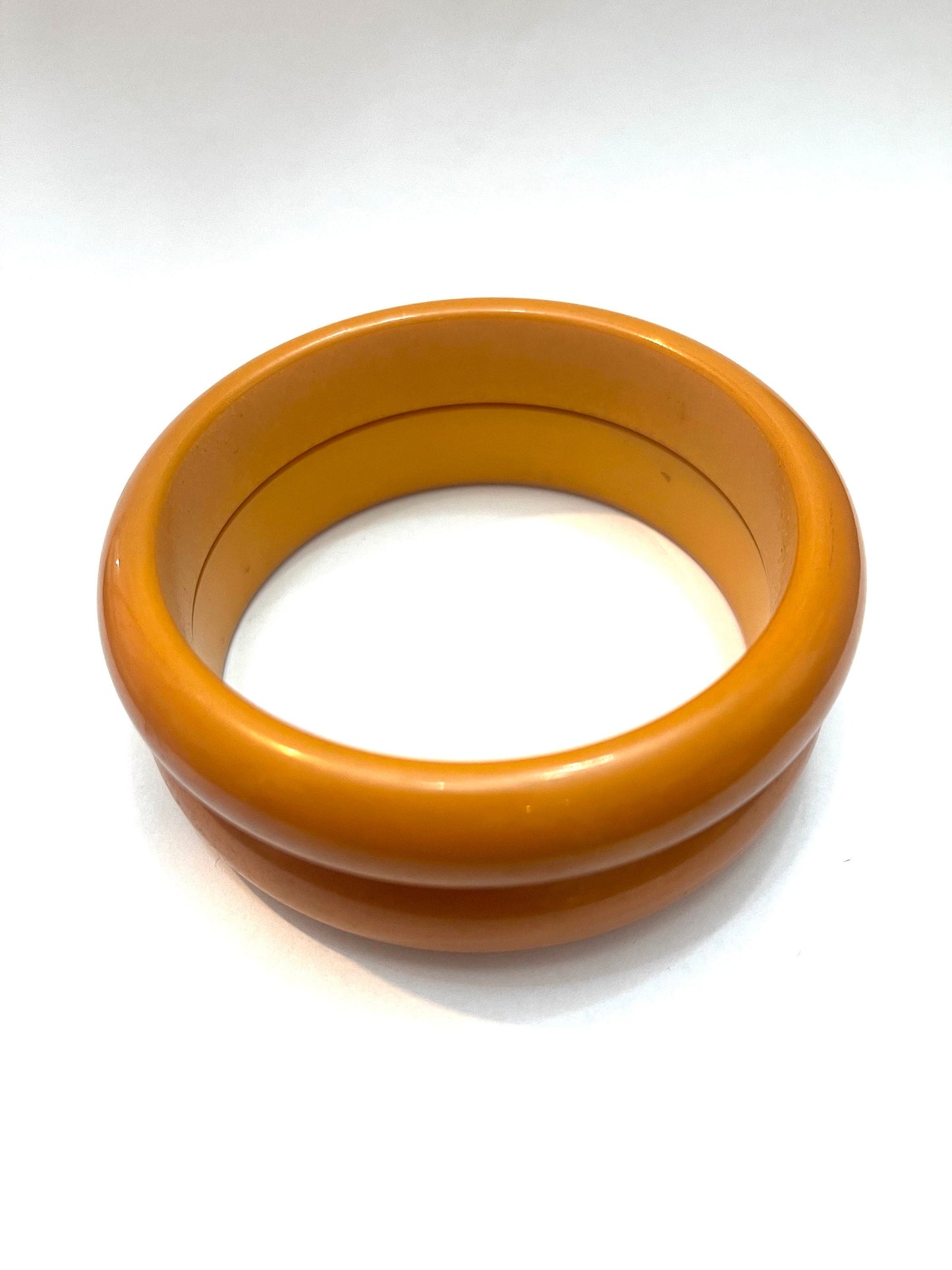 1950s ca plain Bakelite bangle bracelets, coming in a variety of colors in mint condition.