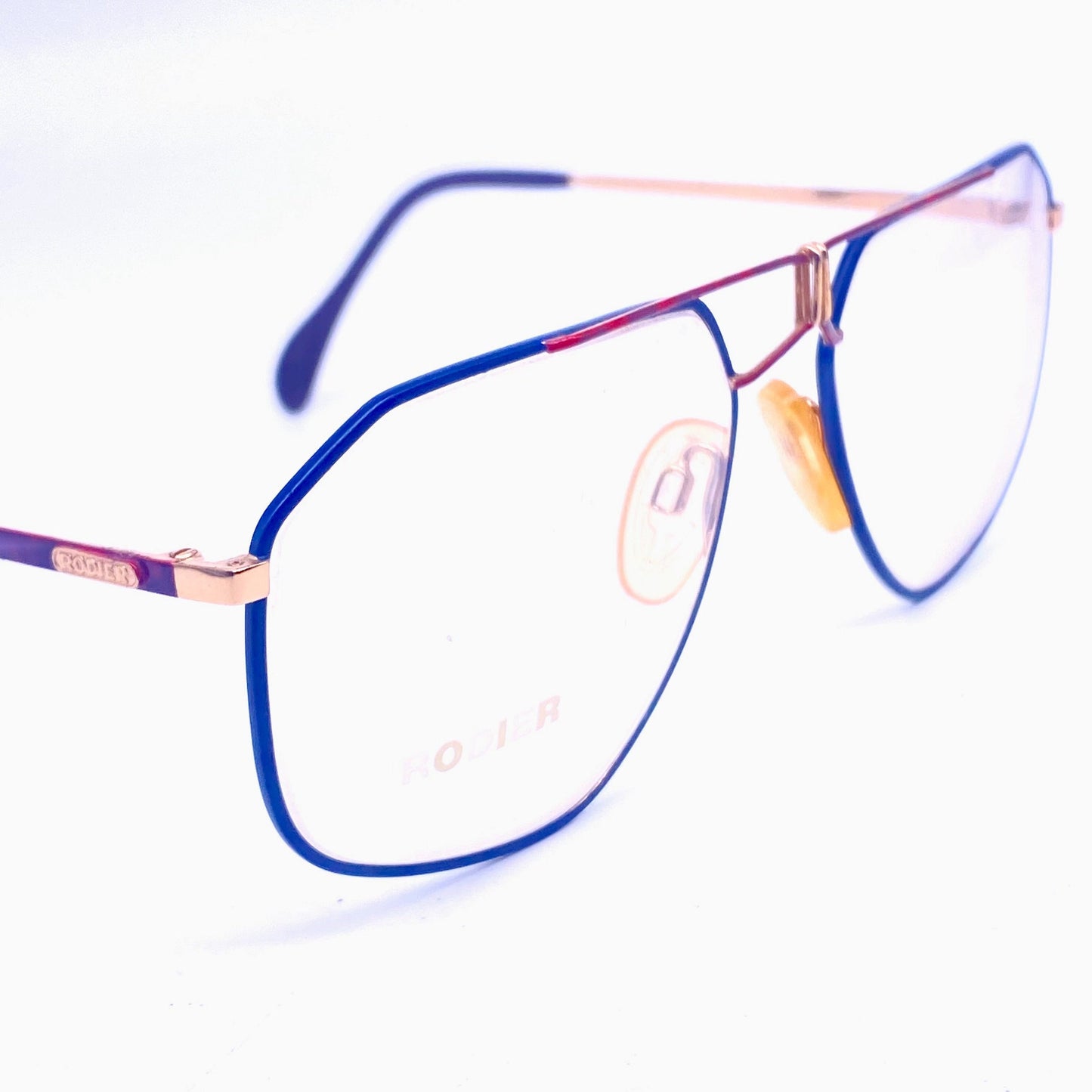 Rodier W Germany golden metal aviator with red/blue enameled and cutoff details, NOS 80s