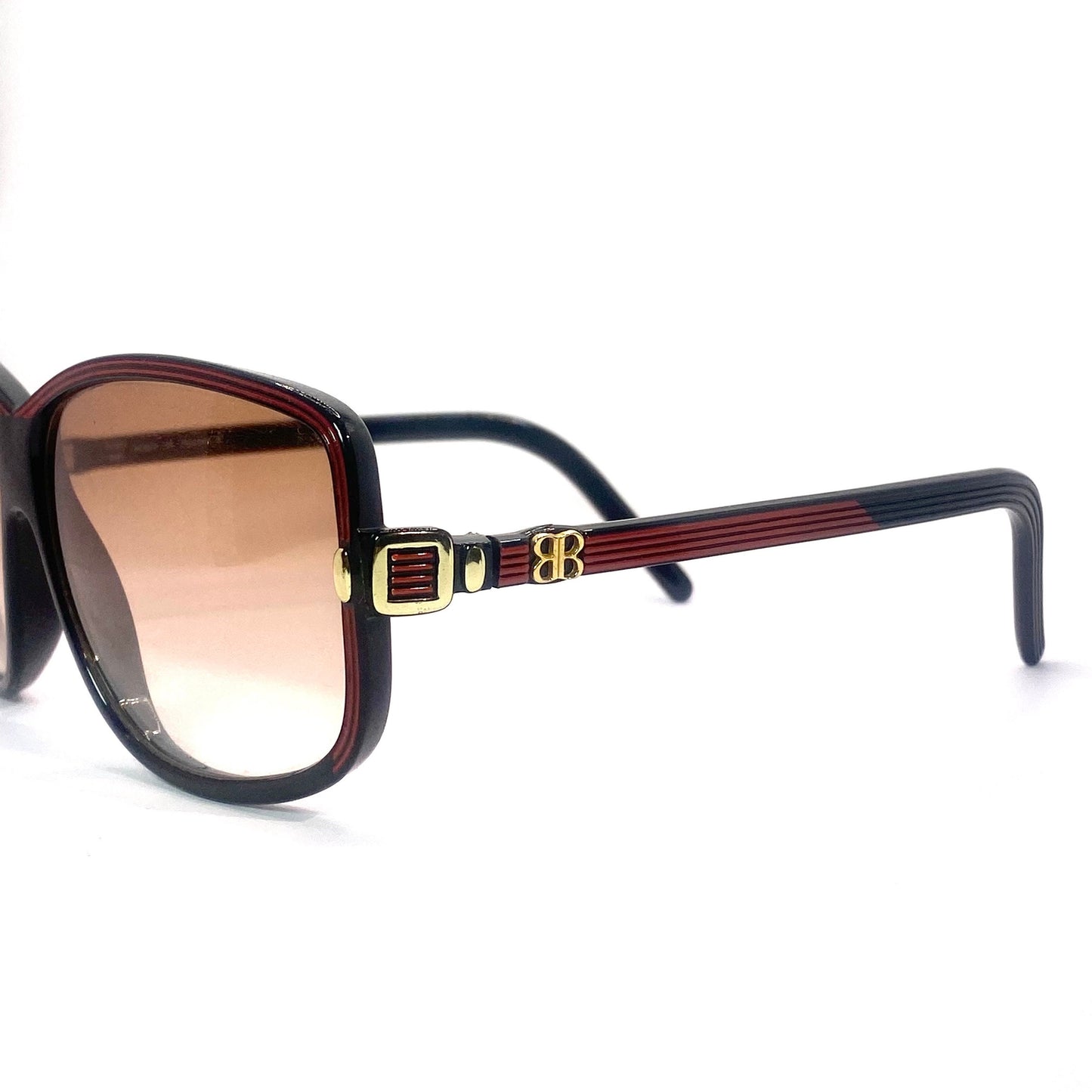 Balenciaga 2026 NR oversized black sunglasses with red carved stripes and golden logo, 80s Made in France