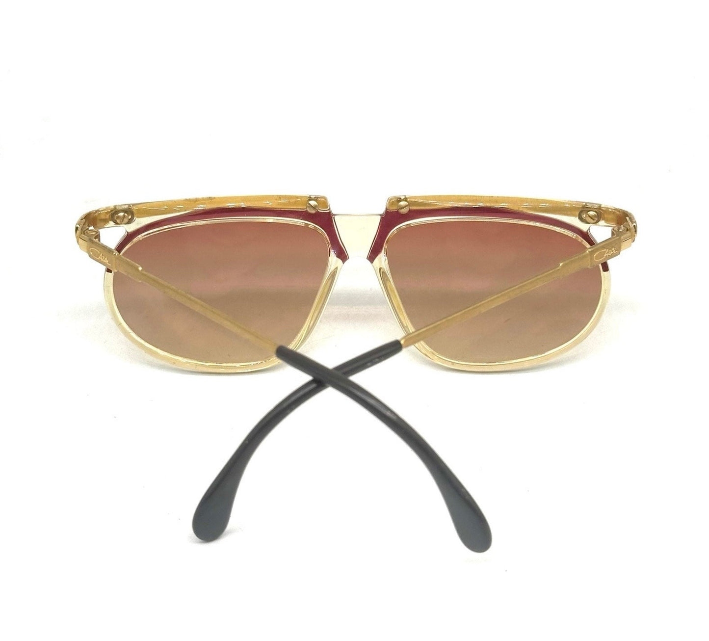 Cazal mod. 335 avant garde clear/red cello sunglasses w golden metal browline and temples, NOS 80s W Germany