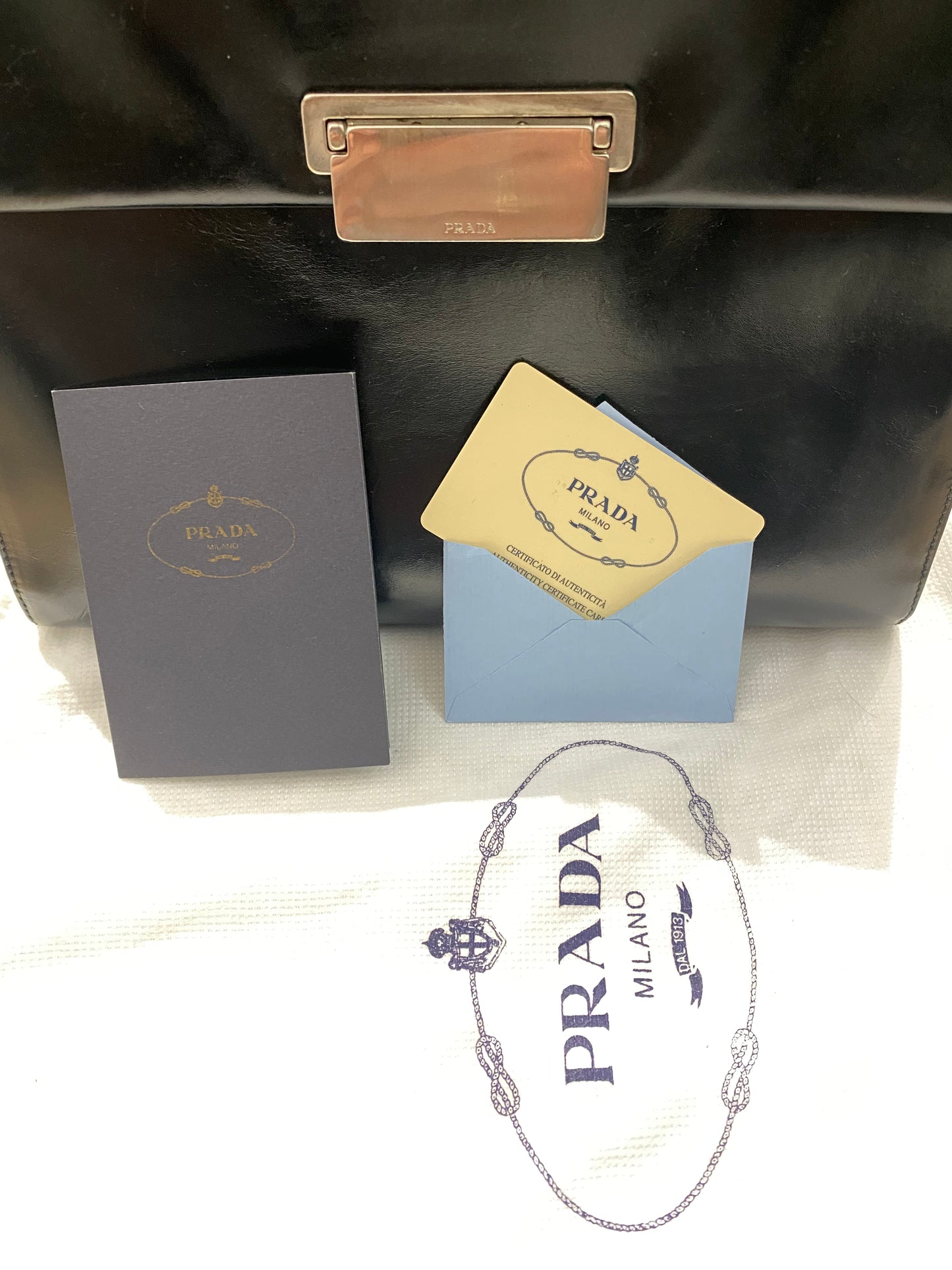 Prada black leather handbag with dustbag and certificates, mint