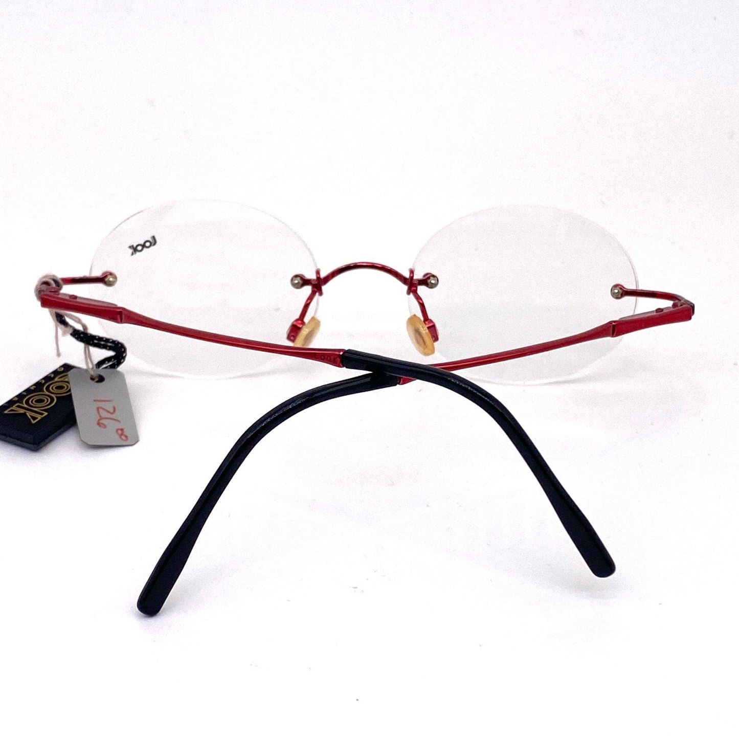 T look oval rimless red metal eyeglasses frames made in italy, 1980s nos