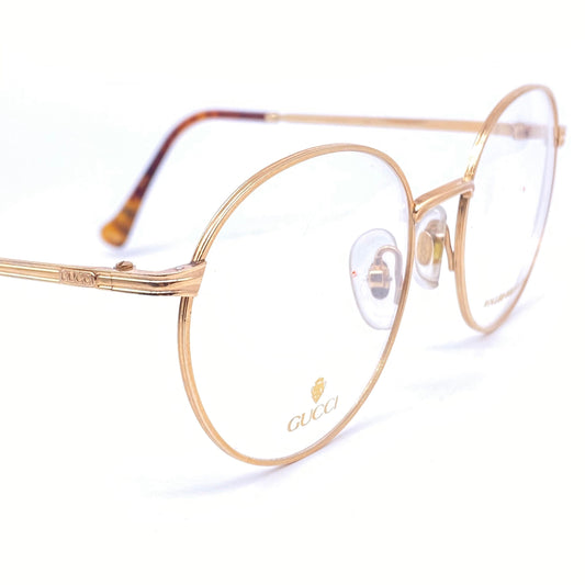 Gucci GG 1273 round gold plated metal frames made in Italy, 1980s NOs
