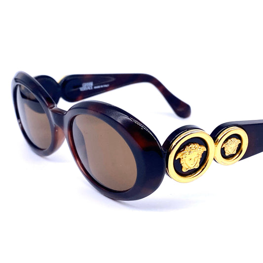 Gianni Versace 527 oval ladies tortoise sunglasses with double golden Medusa detail, 1990s