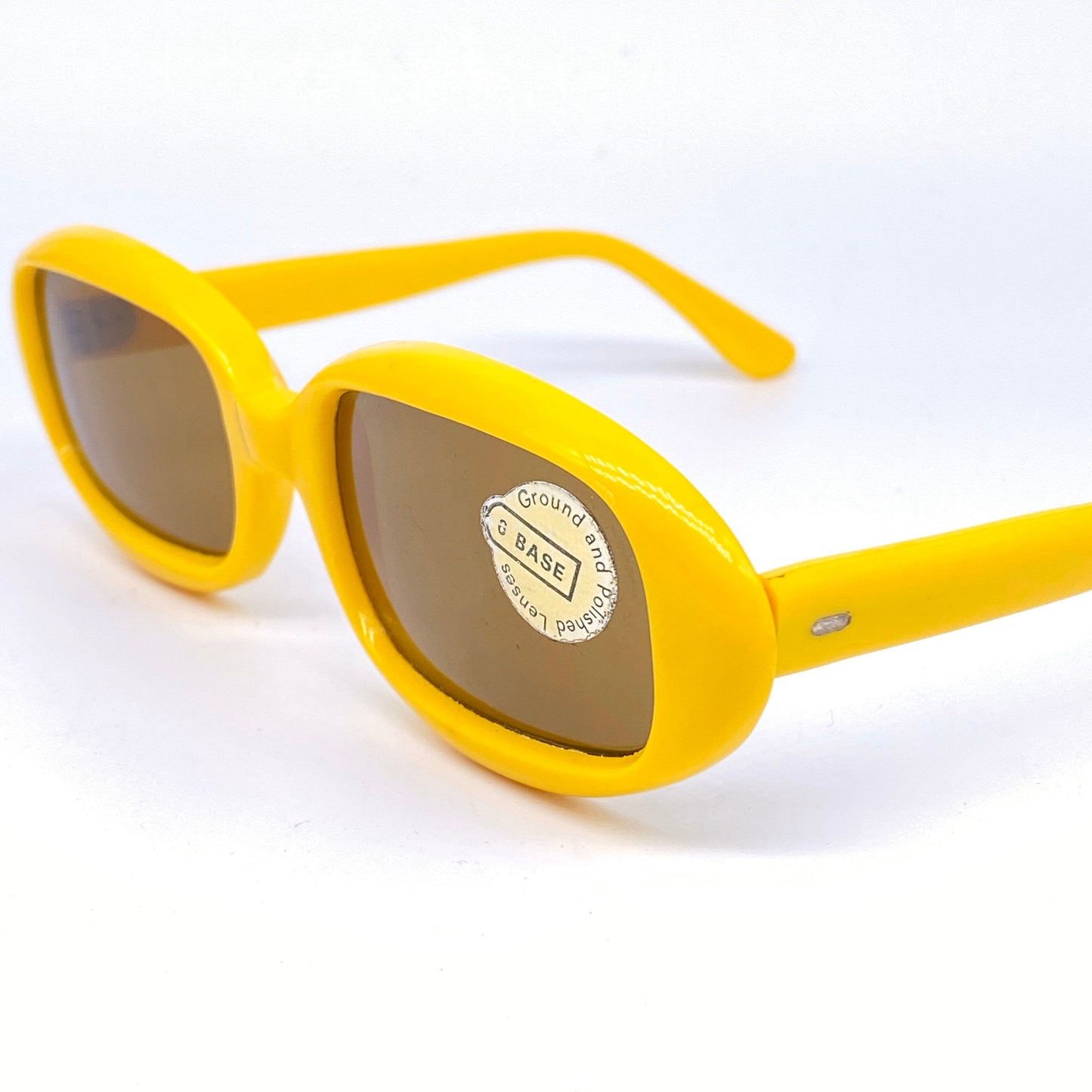 1960s NOS colorful Mod oval sunglasses with square lenses cut, coming in pink or yellow