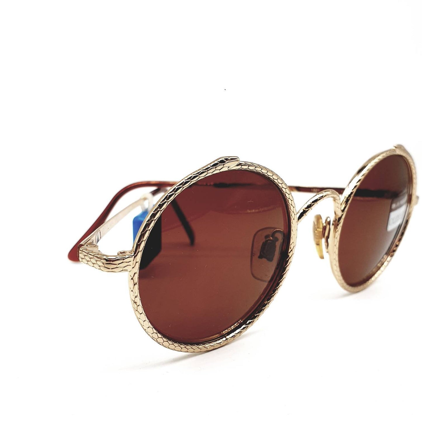 Oliver Valentino 1821 903 Esoteric golden snake round shape sunglasses, w/amazing carved snake. New and unworn conditions.