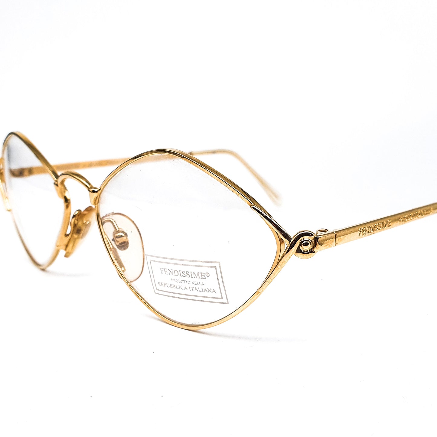 Fendissime satin gold drop shaped lenses with pointing browline minimalistic eyeglasses frames made in Italy, 1980s NOs