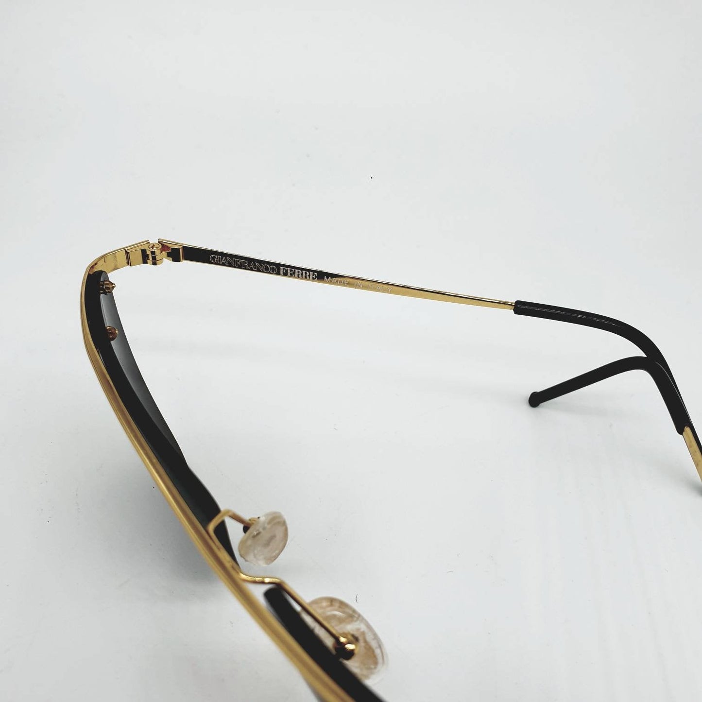 Gianfranco Ferrè GFF 56/s  golden metal cat eyes rimless w/ cut off frame name sunglasses made in Italy 1980s NOS