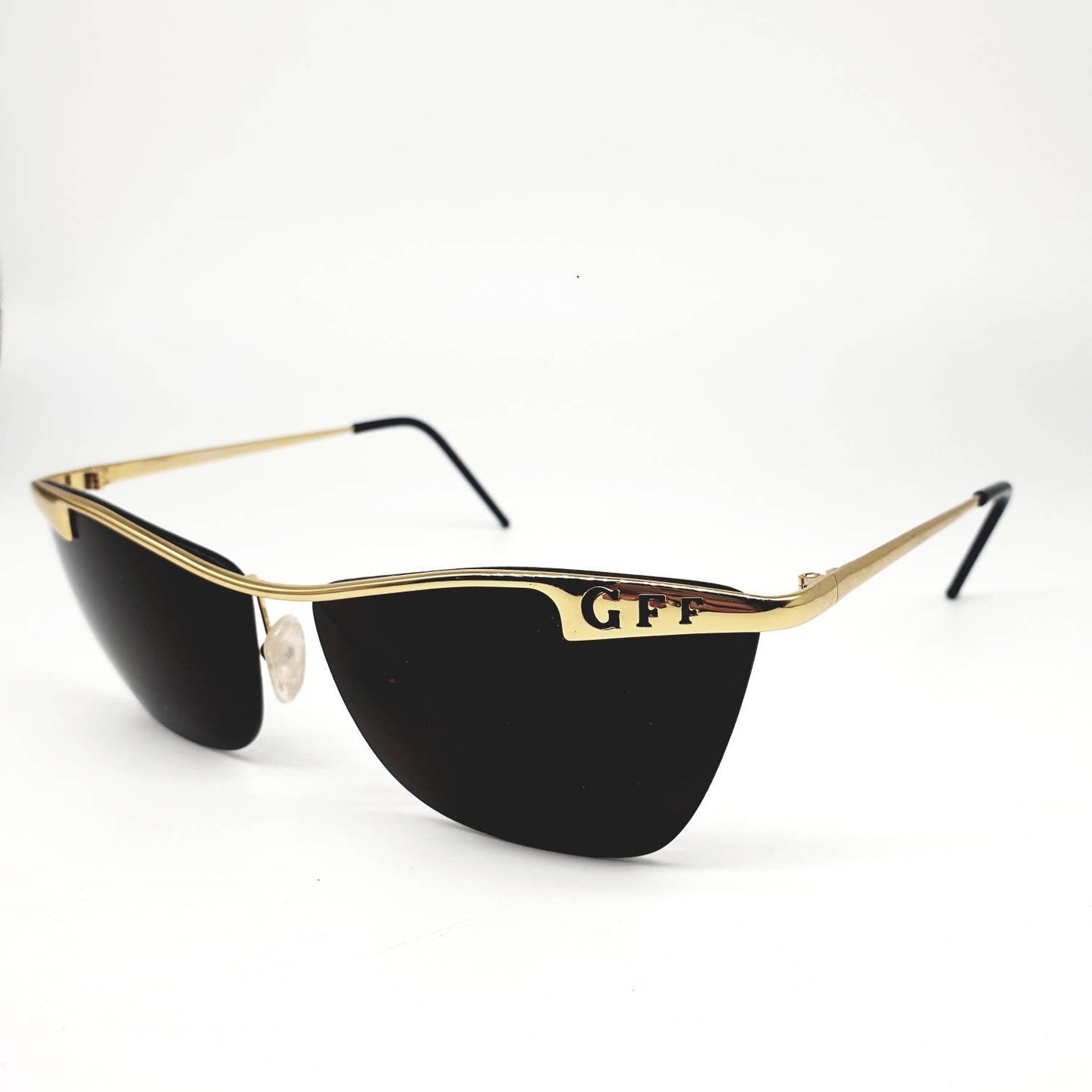 Gianfranco Ferrè GFF 56/s  golden metal cat eyes rimless w/ cut off frame name sunglasses made in Italy 1980s NOS